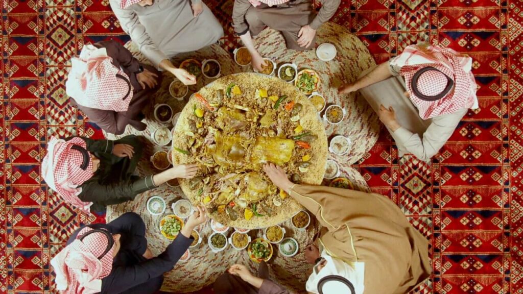 Overhead shot of men having a meal together